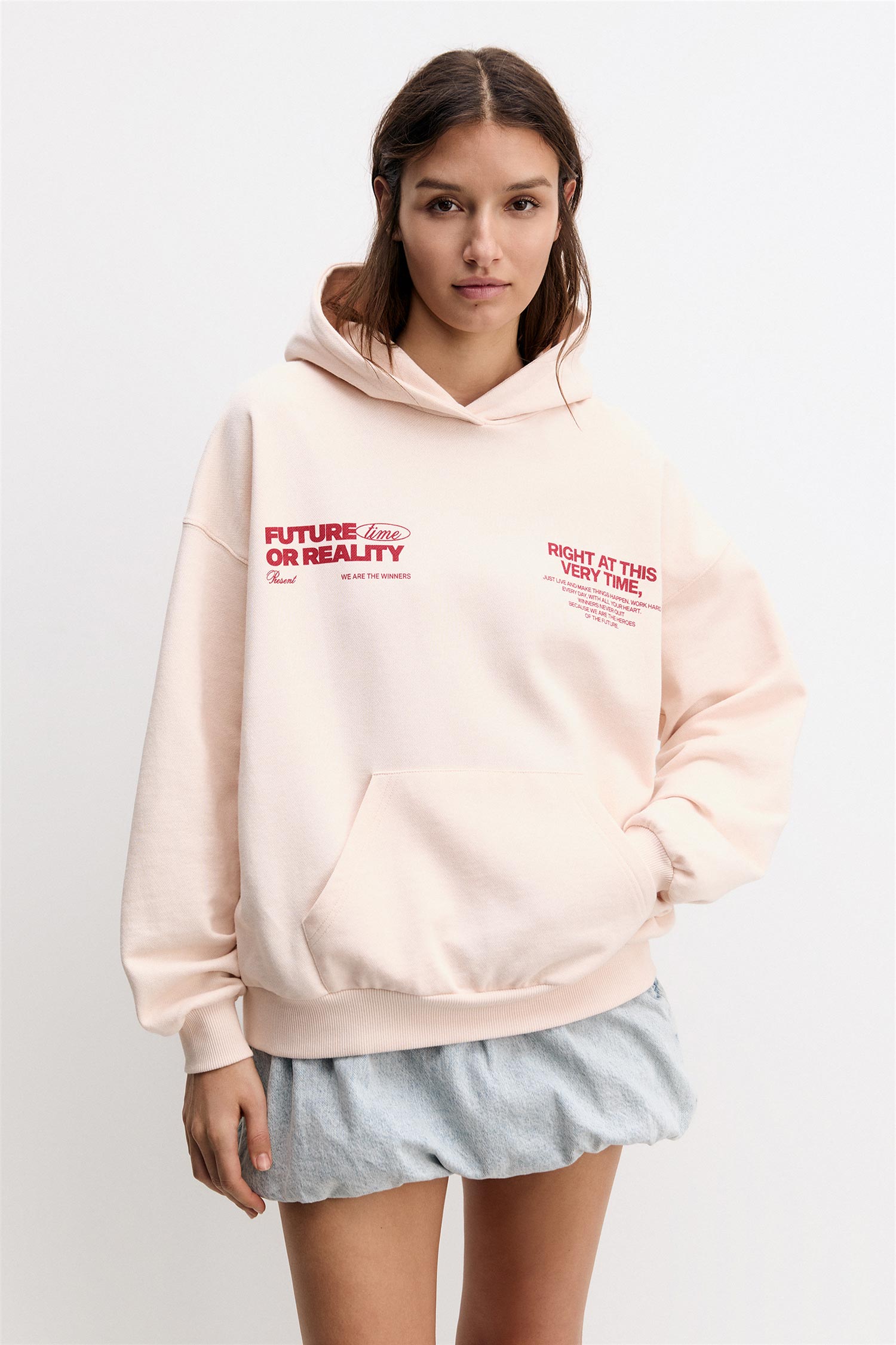 RED SWEATSHIRT WITH SLOGAN